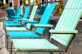 a row of blue and green terrace chairs Royalty Free Stock Photo