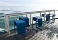 Row of blue weave bar stools Royalty Free Stock Photo
