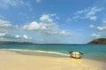 Row boat on Caribbean island beach Royalty Free Stock Photo