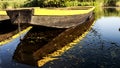 Row boat floating on the lake and reflects in it Royalty Free Stock Photo