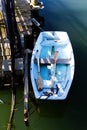 Row Boat Tied To Dock With Oars From Above Royalty Free Stock Photo