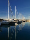 Row of boats parked in marina at sunset Royalty Free Stock Photo