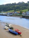 Row boats on river bank at low tide Royalty Free Stock Photo