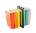 Row of books and electronic book reader Royalty Free Stock Photo