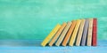 Row of books, grungy background Royalty Free Stock Photo