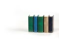 A row of books isolated on white background. Image contains copy space Royalty Free Stock Photo