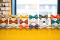 row of bow ties organized by color spectrum in a store display Royalty Free Stock Photo