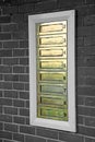 Row of brass letterboxes