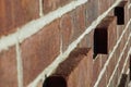 Red bricks close, angled perspective with leading lines