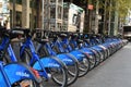Row of bright blue bikes in Citi bike Rentals