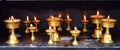 Row of Bronze Lamps - Diwali Festival in India - Spirituality, Religion and Worship Royalty Free Stock Photo