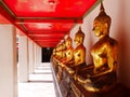 A row of Buddha images at Wat Pho Royalty Free Stock Photo