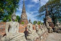 Row of Buddha statues at Wat Yai Chai Mongkhon temple in Ayutthaya, Thailand Royalty Free Stock Photo