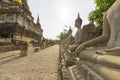 Row of Buddha statues in Wat Yai Chaimongkol in Ayutthaya Royalty Free Stock Photo