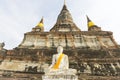 Row of Buddha statues in Wat Yai Chaimongkol in Ayutthaya Royalty Free Stock Photo