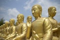 Row of Buddhist disciple statues Royalty Free Stock Photo