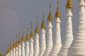 A row of Buddhist stupas, in Sanda Muni Pagoda, Mandalay Royalty Free Stock Photo