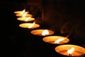 Row of burning candles Royalty Free Stock Photo