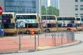a row of buses at the bus terminal in pak shek kok hongkong