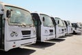 Row of buses waiting on bus station near port