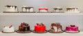 A row of cakes with different flavors and decorations Royalty Free Stock Photo