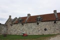 Row of canons in outer wall with buildings in the background of Fort Ticonderoga in Ticonderoga, New York