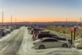 Row of cars snow drift at terminal parking of Denver International Airport, Colorado