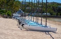 Row Of Catamarans For Hire On A Sandy Beach