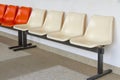 Row chair with cream and orange color Royalty Free Stock Photo