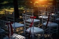 Row of chairs for outdoor wedding ceremony, close-up. Chairs are prepared for the reception Royalty Free Stock Photo