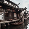 Cityscape featuring Chinese architecture along a waterway with a bridge Royalty Free Stock Photo