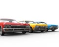 Row Of Classic Muscle Cars - Studio Shot