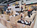 Row of Classified Growths bottles French wines display for sell in the supermarket shelves