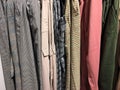 Eautiful colorful clothes in a store on hangers Royalty Free Stock Photo