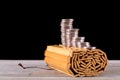 A row of coins are on the bamboo slips of ancient books Royalty Free Stock Photo