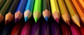 Row of Colored Pencils With Black Background Royalty Free Stock Photo