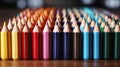 Row of colored pencils sitting on top of woode. Generative AI.