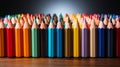 Row of colored pencils sitting on top of woode. Generative AI.