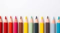 Row of colored pencils on white background Royalty Free Stock Photo
