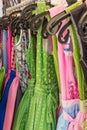 Row of colorful austrain and bavarian dirndl dresses hanging on