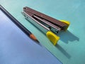 row of colorful background on Pencil And Stapler