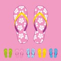 Row of colorful beach flip flops over color background Royalty Free Stock Photo