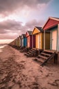 a row of colorful beach huts on a sandy shore Royalty Free Stock Photo
