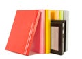 Row of colorful books and electronic book reader Royalty Free Stock Photo