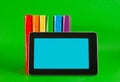 Row of colorful books and tablet PC Royalty Free Stock Photo