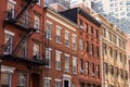 Row of Colorful Brick Residential Buildings in Chelsea of New York City Royalty Free Stock Photo