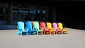 Row of colorful chairs near ferry harbor