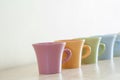 Row of colorful coffee cups Royalty Free Stock Photo