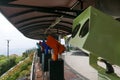 A row of colorful coin operated binocular