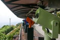 A row of colorful coin operated binocular